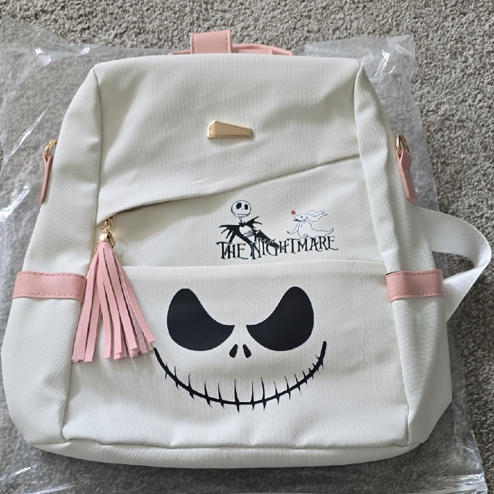 White and Pink Backpack with Skull Design. Brand New.